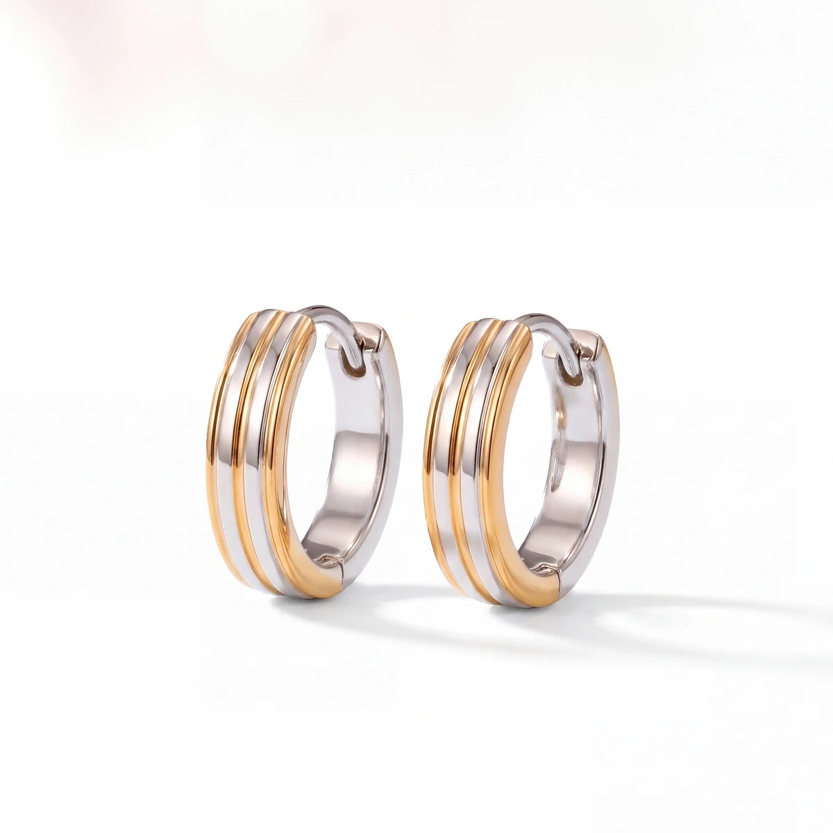 Tara two-tone huggie earrings for women, gold & silver-tone - RANGREZ