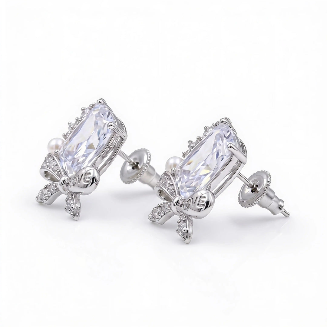 Bowelle White Crystal & Pearl Bow Stud Earrings, Cushion cut, Rhodium finish
