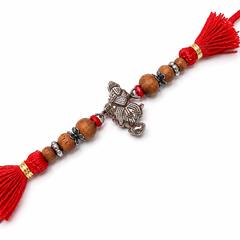 Sandalwood Bead Ganesha 92.5 Silver Rakhi with Red Tassels