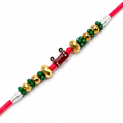 Ruby Red Accent 92.5 Silver Rakhi with Green & Gold Beads