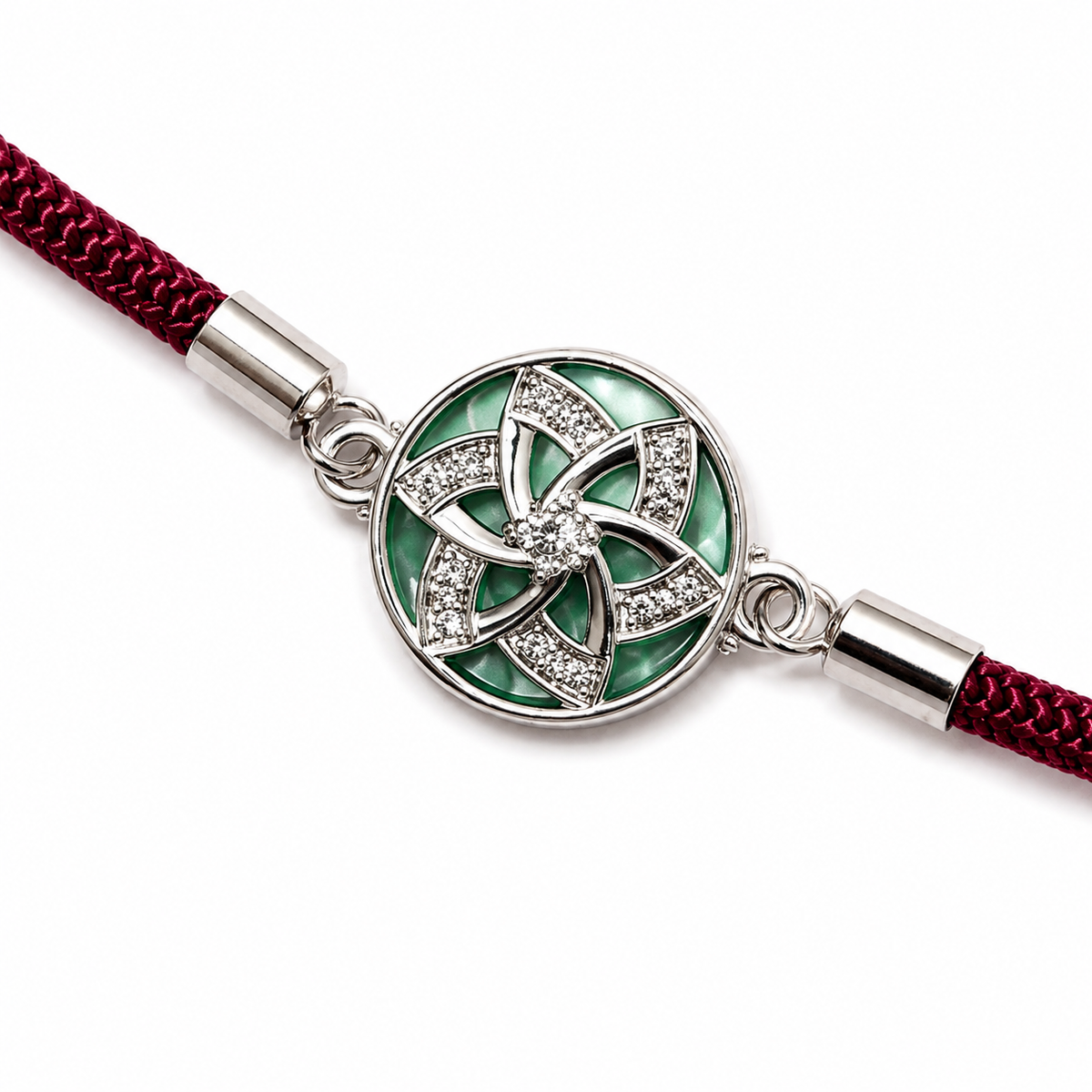 Green Pinwheel CZ Disc 92.5 Silver Rakhi on Maroon Cord