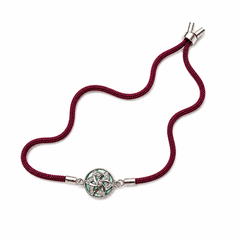 Green Pinwheel CZ Disc 92.5 Silver Rakhi on Maroon Cord