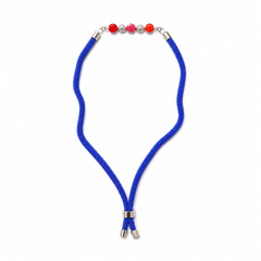 Red-Orange Crystal 92.5 Silver Rakhi on Royal Blue Cord