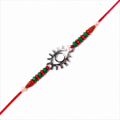 Antique Sunburst 92.5 Silver Rakhi with Red & Green Beads