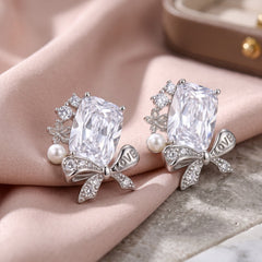 Bowelle White Crystal & Pearl Bow Stud Earrings, Cushion cut, Rhodium finish