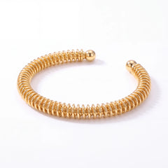 Spiralis open cuff bracelet for women, gold-tone - RANGREZ