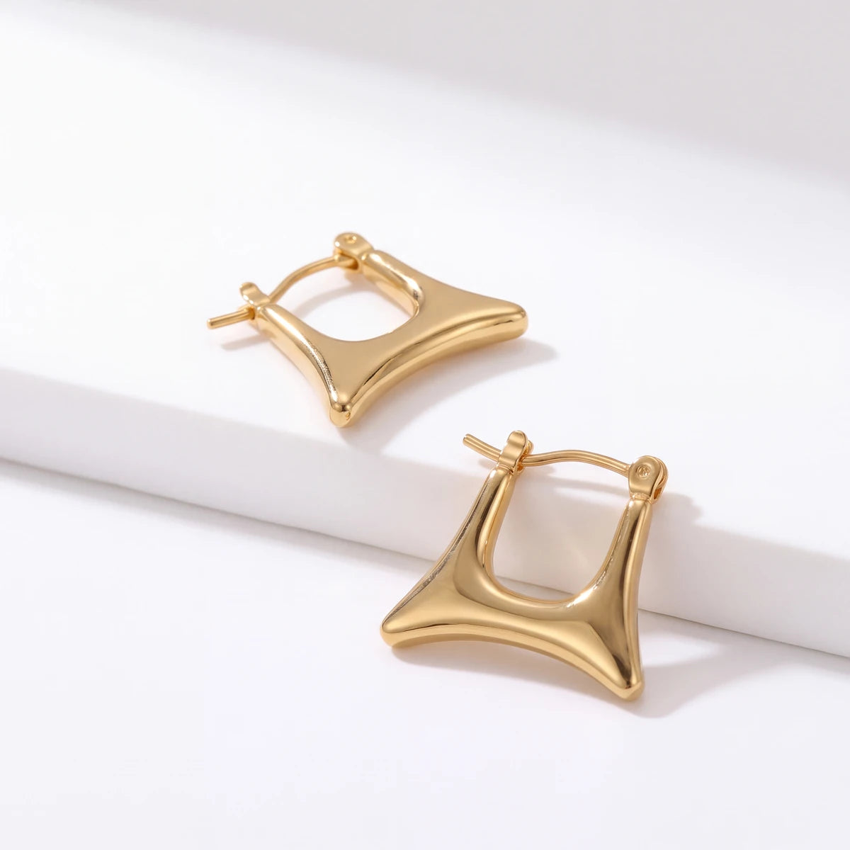 Vela statement hoop earrings for women, gold-tone - RANGREZ